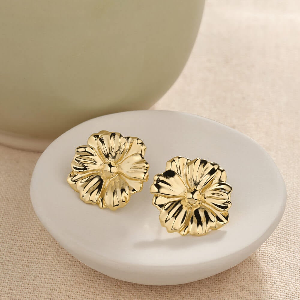 gold plated flower earrings. shop event earrings