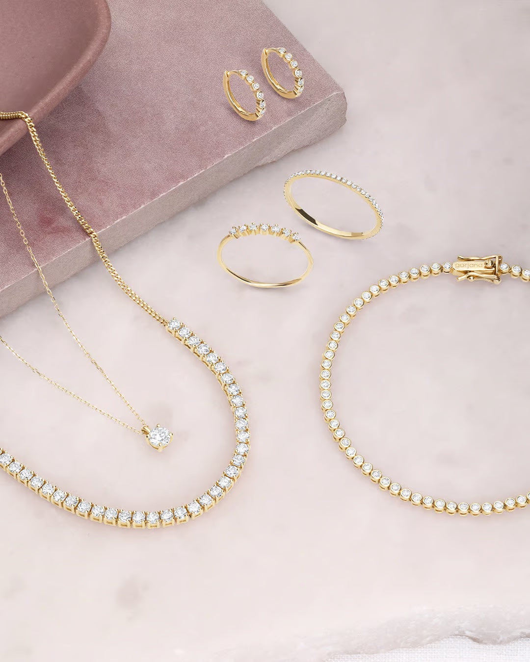 diamond necklace, rings, earrings and bracelets