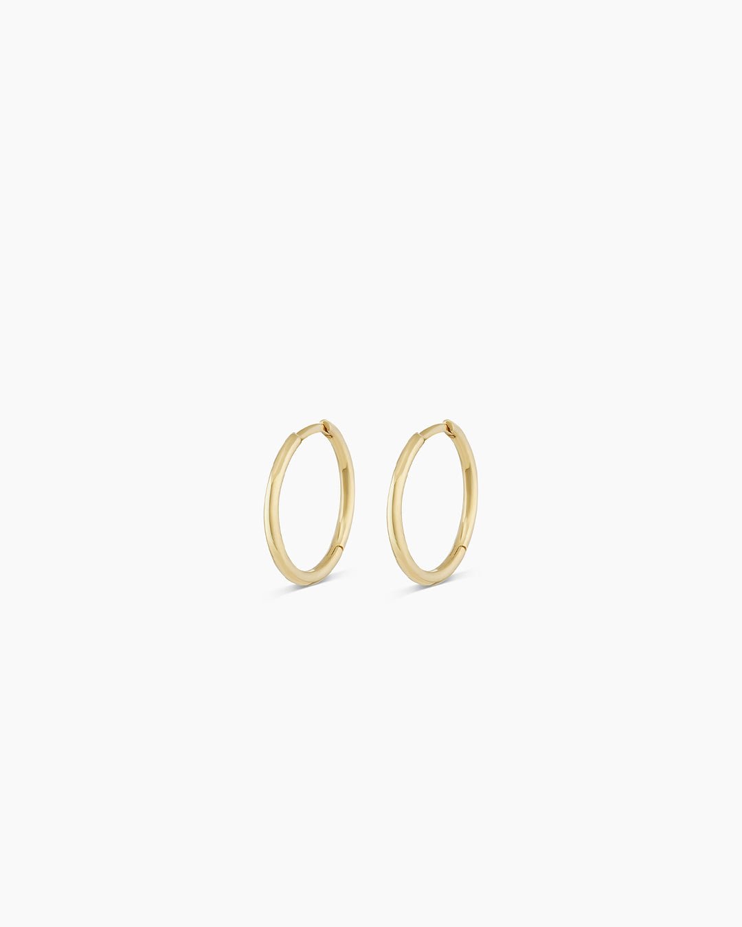 Woman wearing Classic Gold Huggie || option::14k Solid Gold, 11mm, Pair