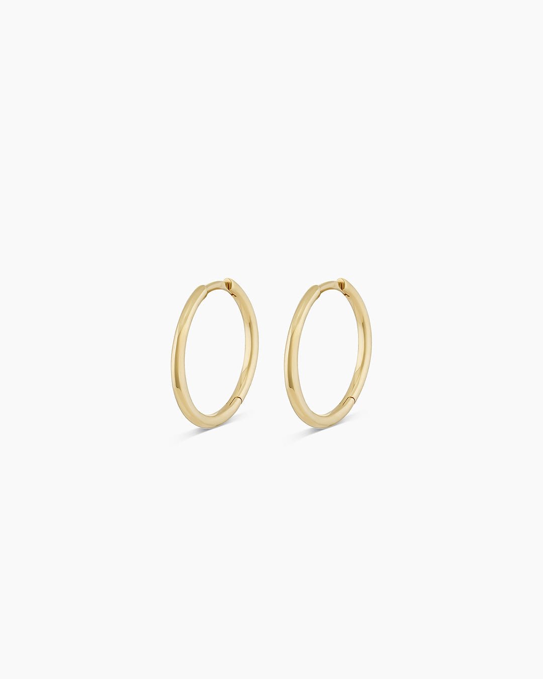 Woman wearing Classic Gold Huggie || option::14k Solid Gold, 15mm, Pair