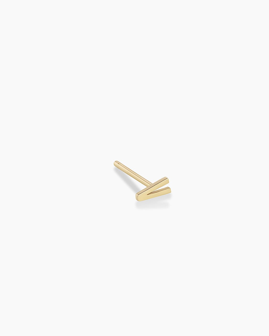 Woman wearing alphabet earring stud || option::14k Solid Gold, V, Single