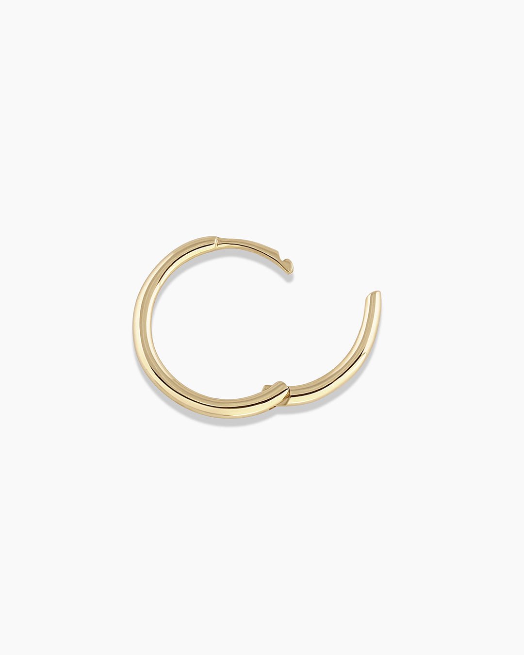 Woman wearing Classic Gold Huggie || option::14k Solid Gold, 13mm, Single