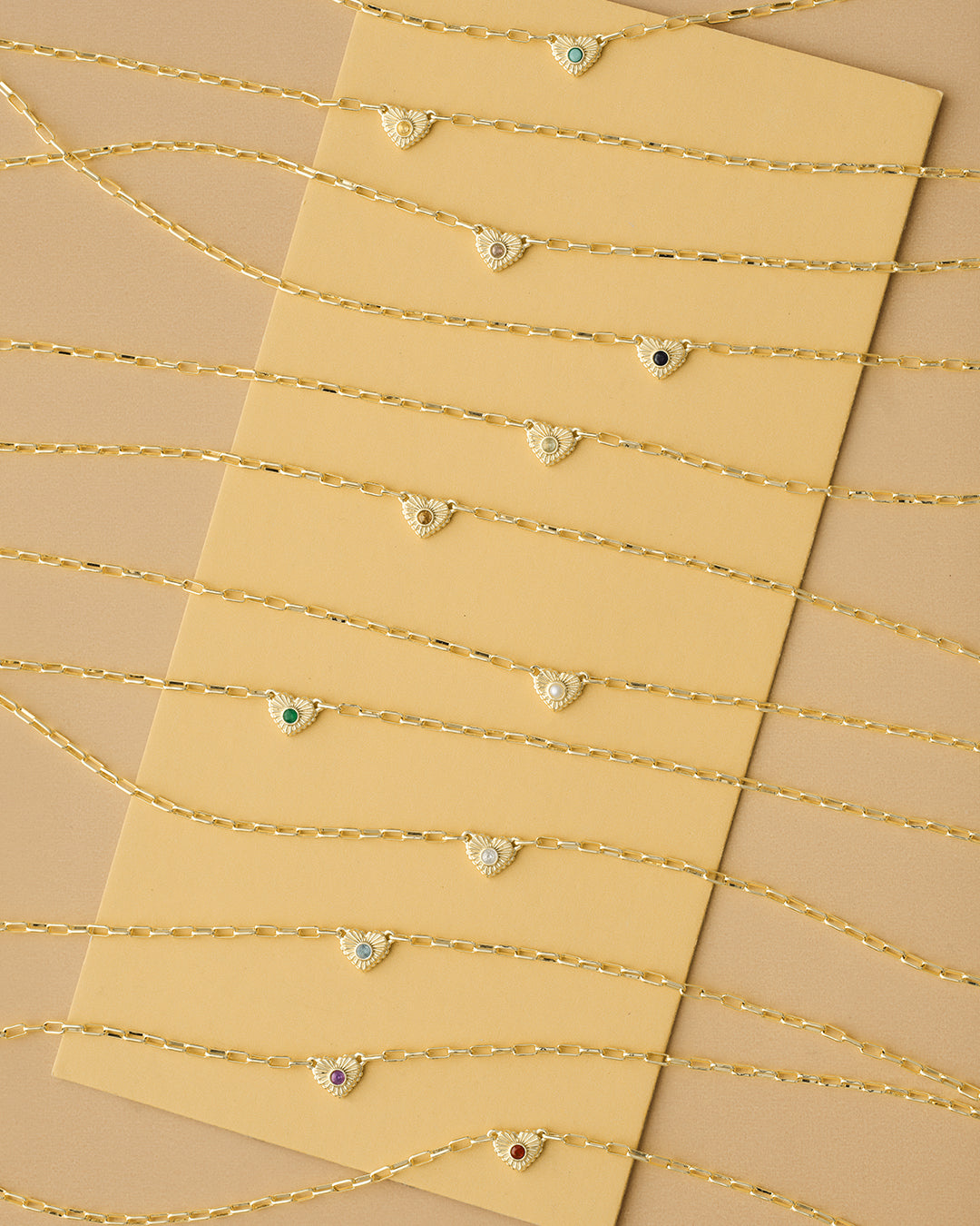 Gold plated heart and birthstone necklaces. Shop Birthstones