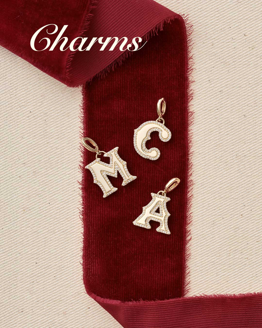 Solid gold alphabet charms. Charms