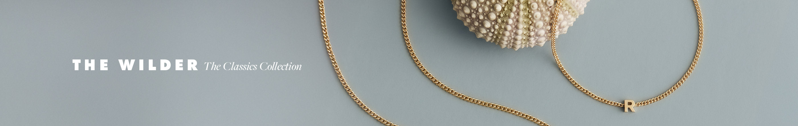 Gold plated initial styles. "THE WILDER The classics collection"