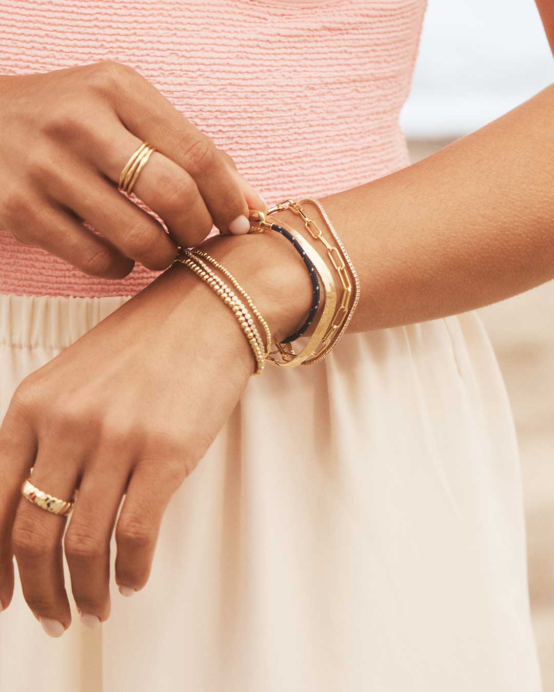 stacked gold bracelets