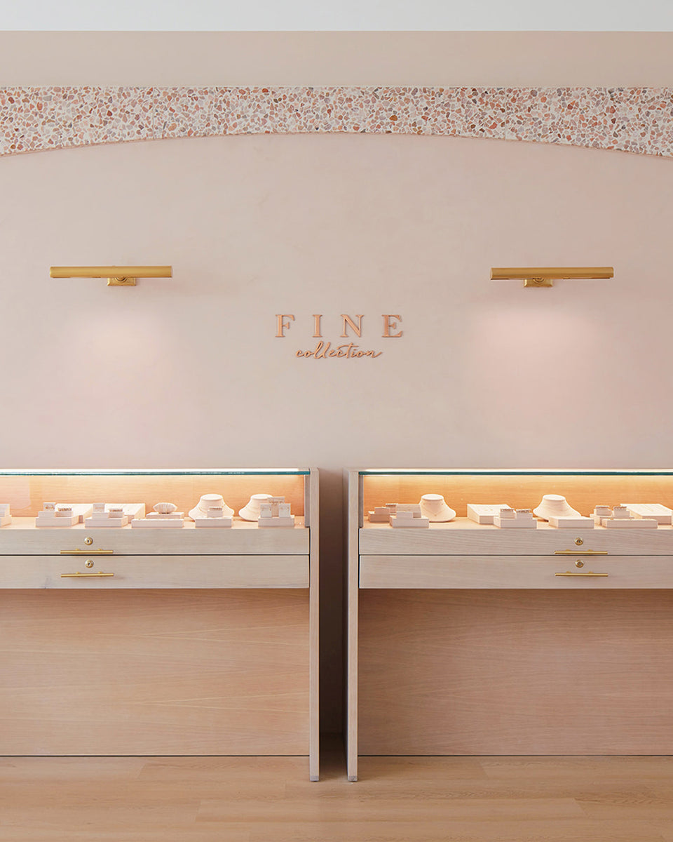 fine jewelry collection with glass cases in store