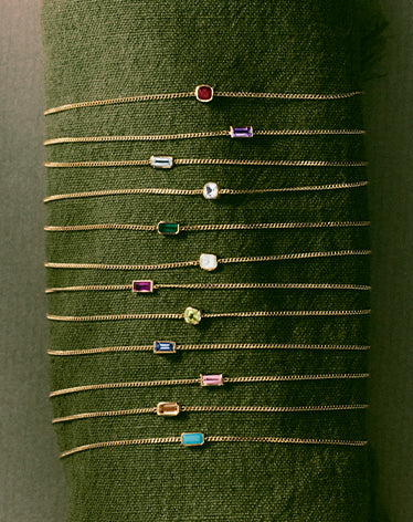 solid gold and gemstone bracelets