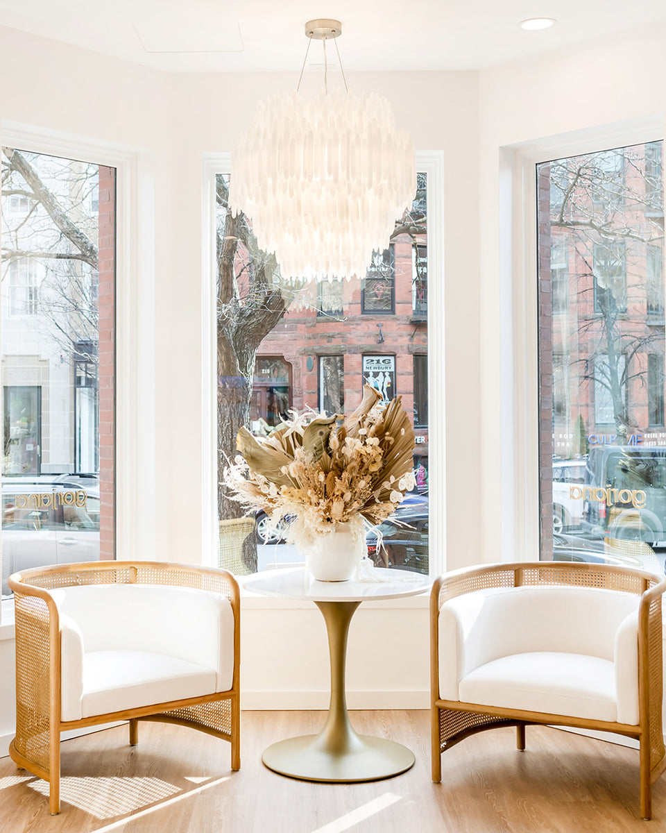 seating area in front of big windows in gorjana store