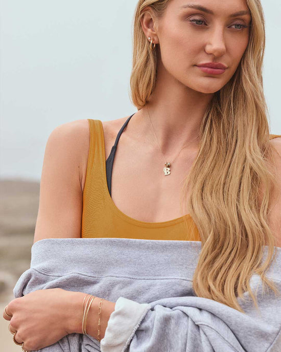 Cameron Brink wearing solid old jewelry 