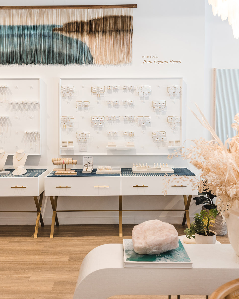 jewelry wall with ocean scape art piece