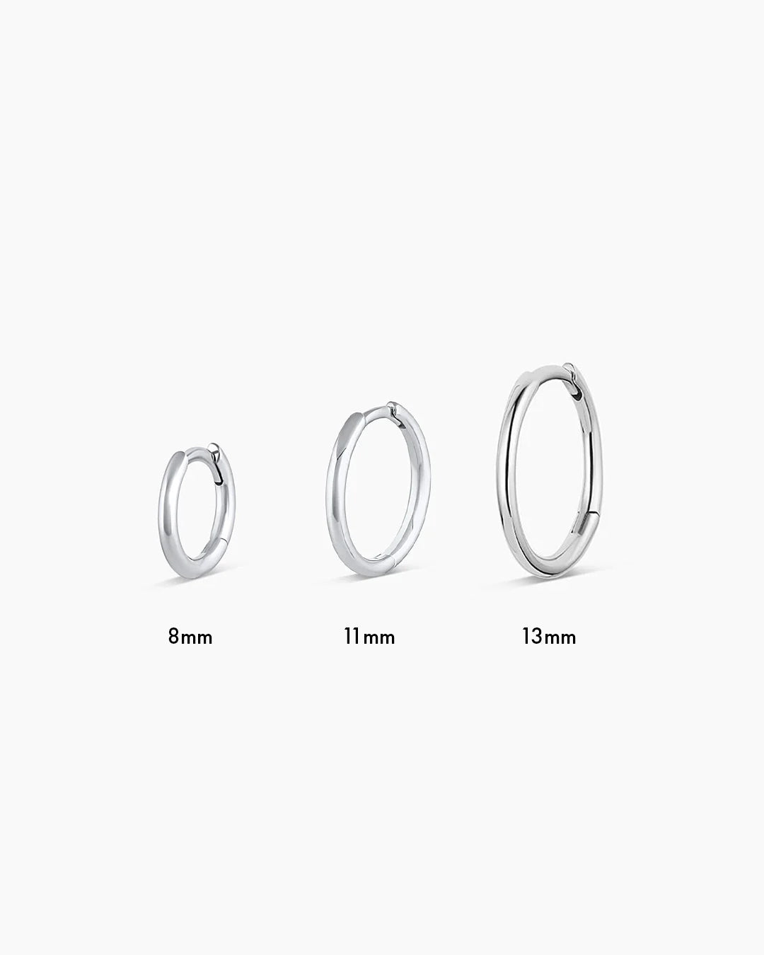 All sizes of white gold classic huggies