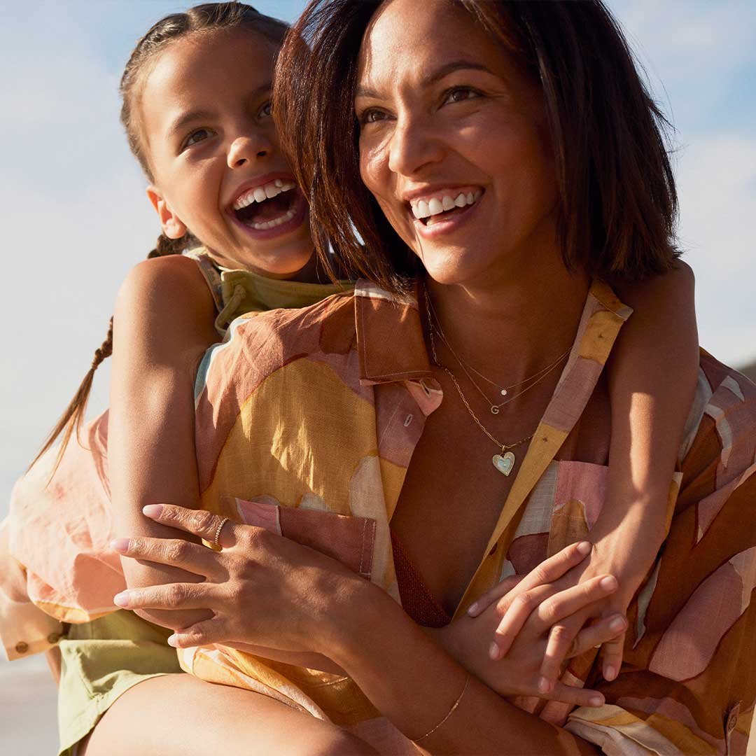 Mother and daughter hugging, part of the gorjana commercial. 