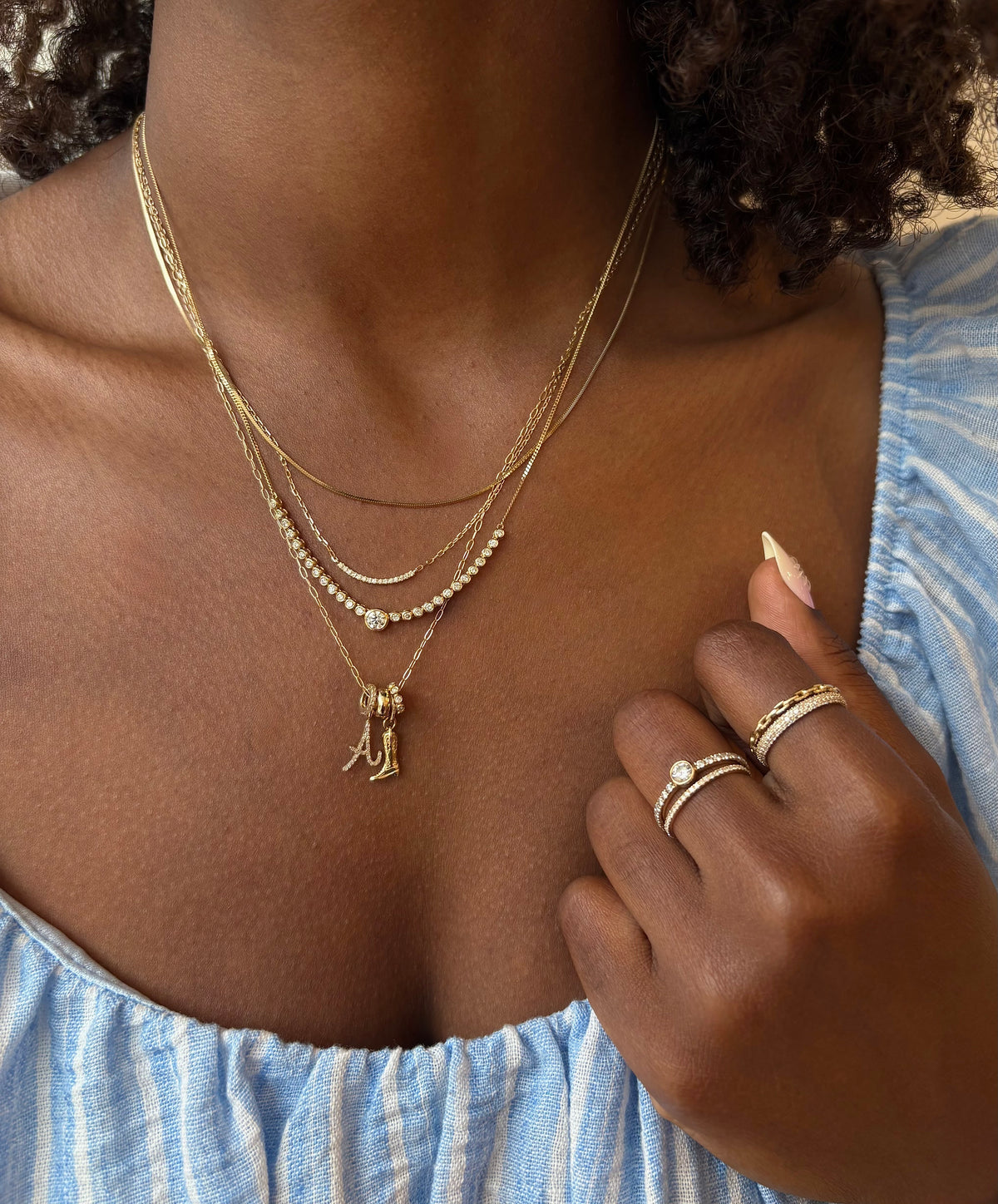 Stylist wearing gorjana April birthstone jewelry at gorjana Avalon