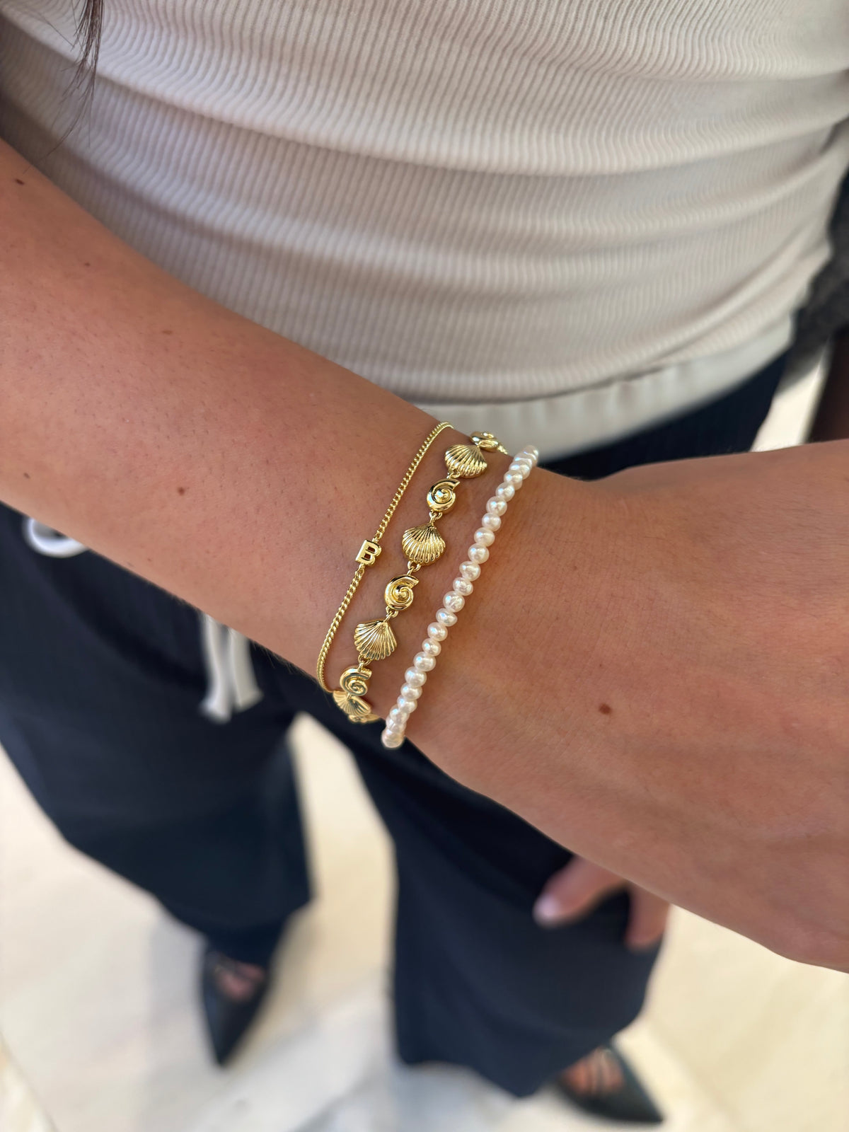 Stylist wearing gorjana jewelry at gorjana Scottsdale Fashion Square