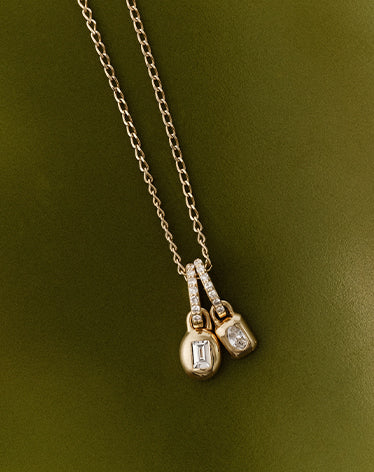 lab grown diamond charms and a chain
