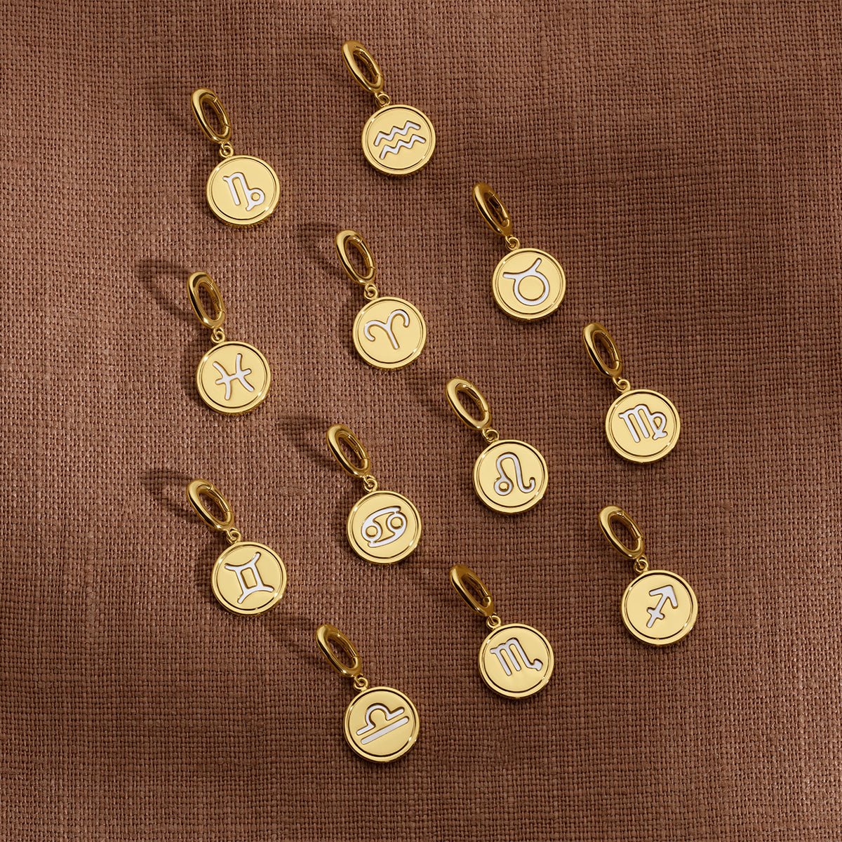 Gold plated zodiac charms. shop zodiac collection