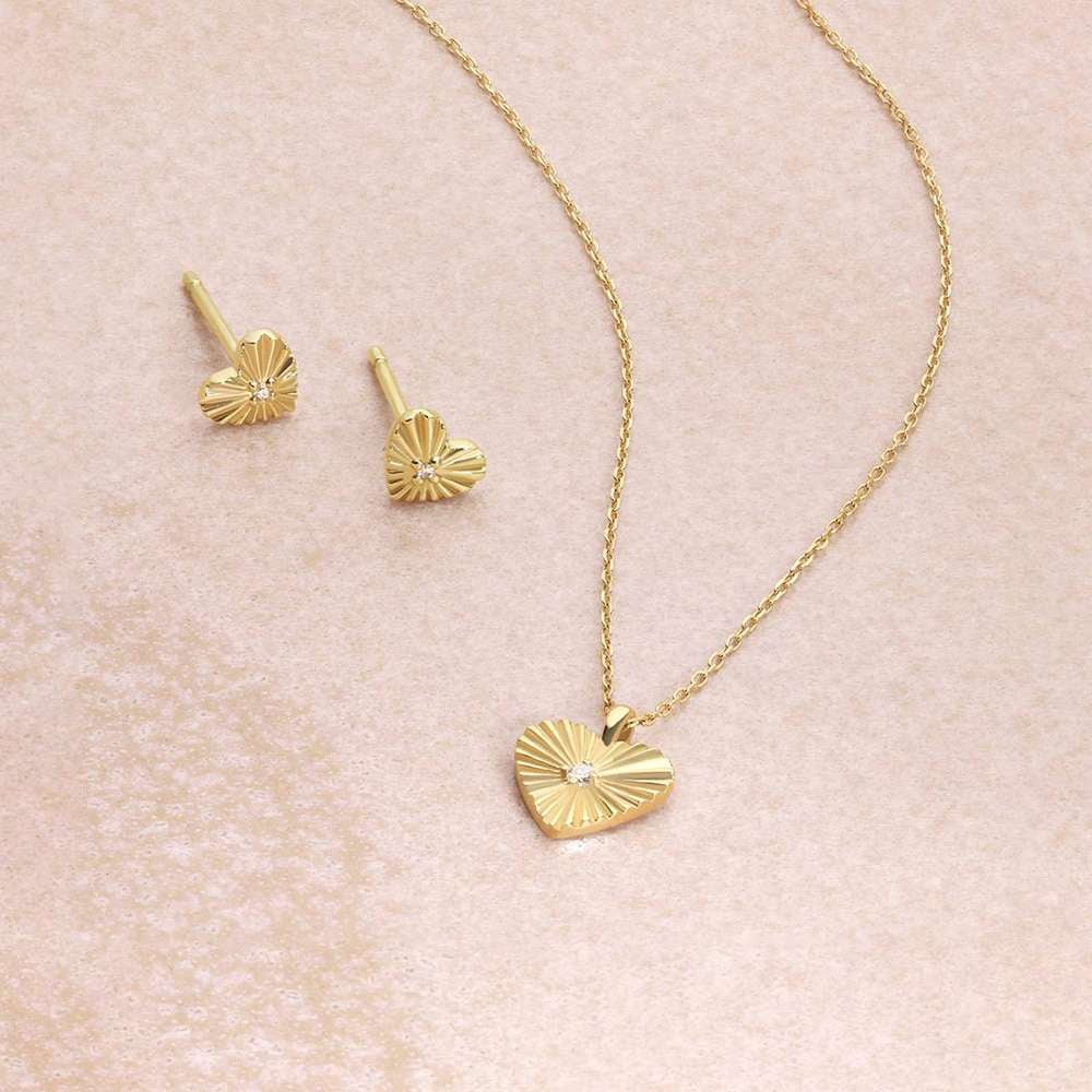 solid gold and diamond heart necklaces and studs