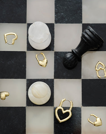 chessboard and gold plated earrings . shop gift guide