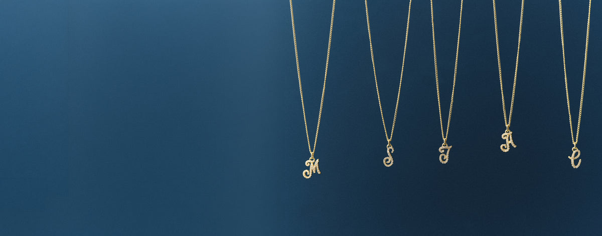 Gold plated shimmer alphabet necklace. Shop Personalized Jewelry