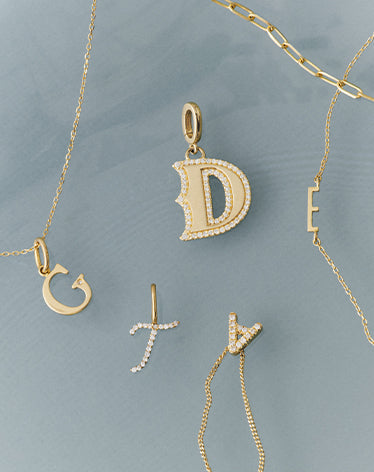 solid gold and diamond alphabet charms