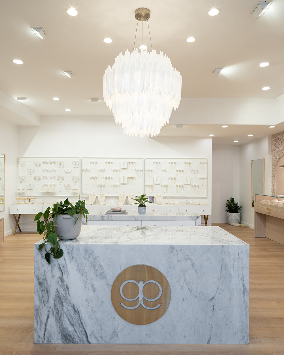 interior of gorjana store with white chandelier 