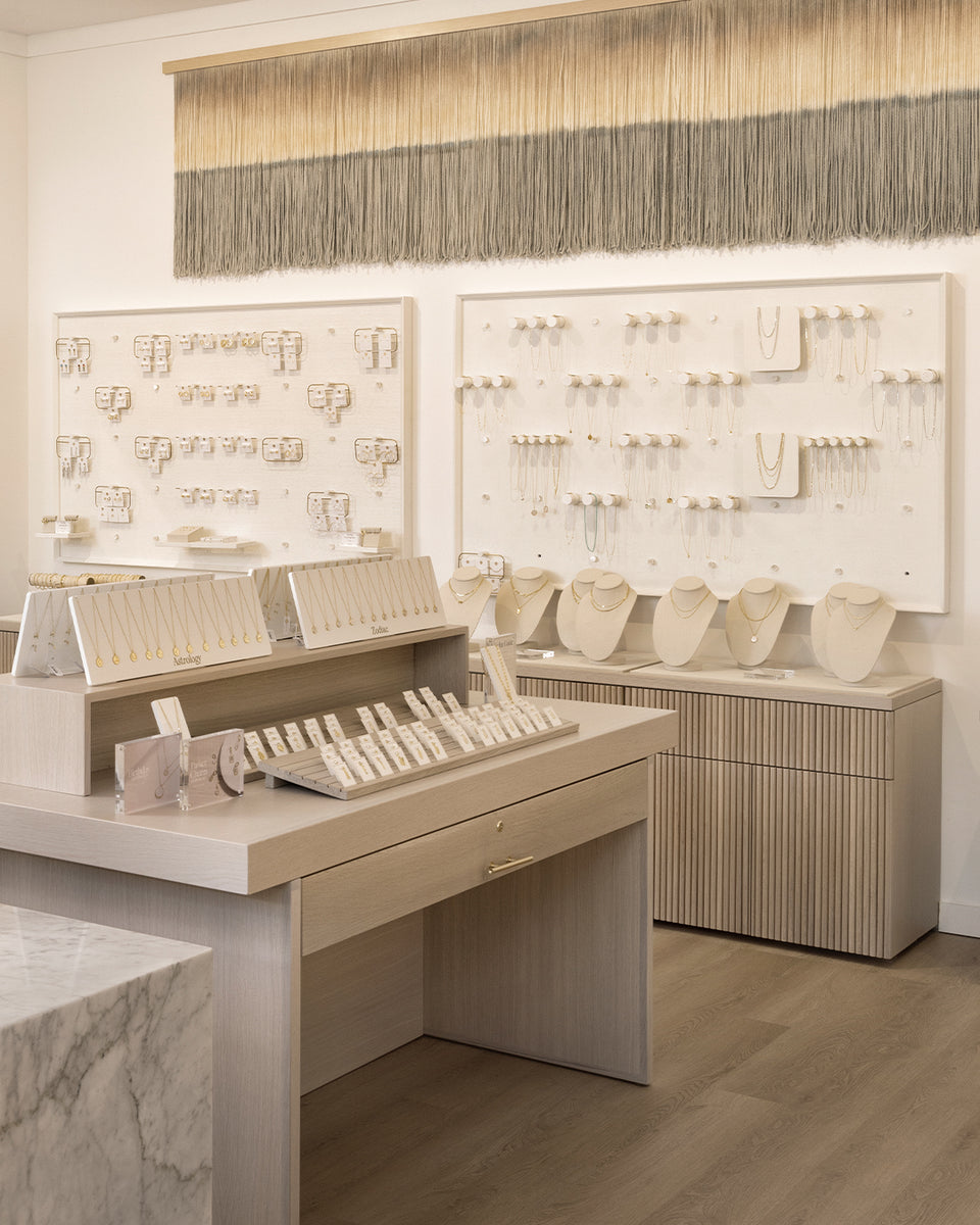 tampa gorjana store interior with jewelry walls and cases