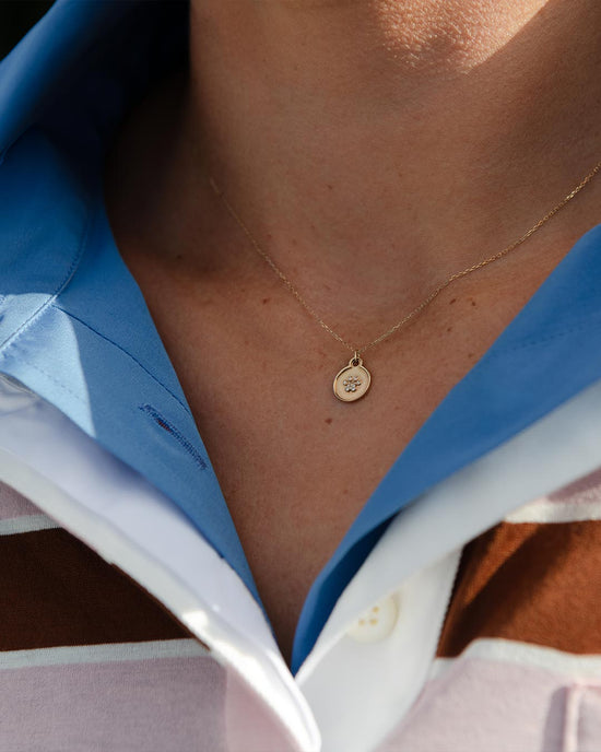 Jessie Pegula wearing  a Diamond Paw Necklace