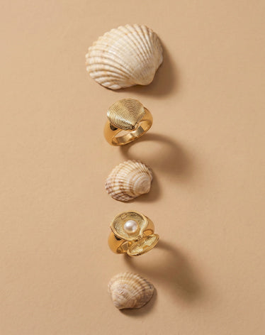 Gold plated pearl rings and shells