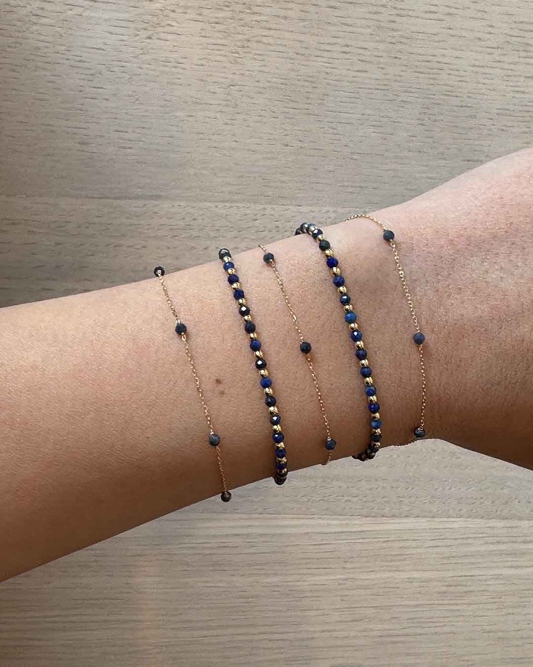 Woman wearing blue sapphire bracelets