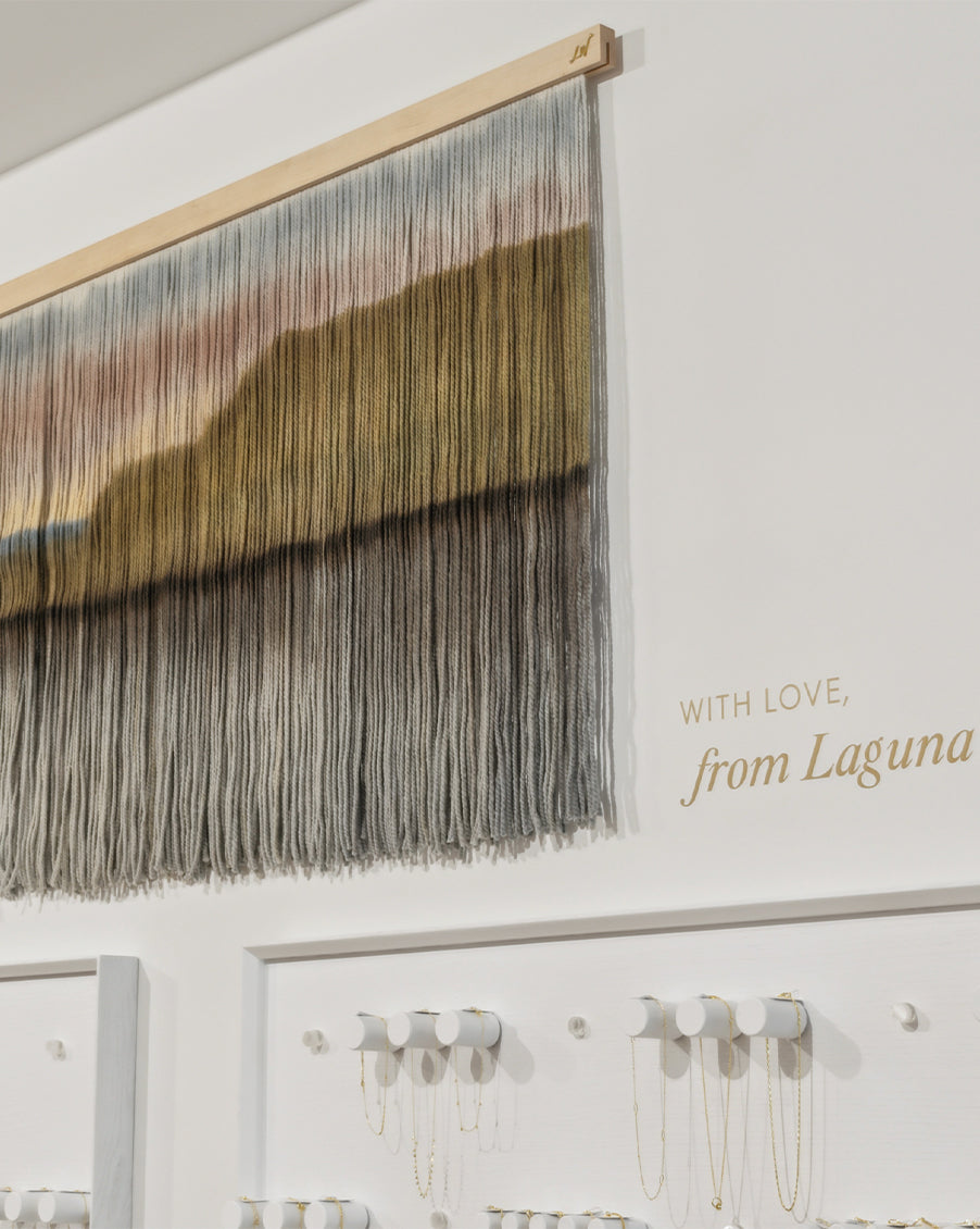 gorjana store interior with art scape of laguna landscape