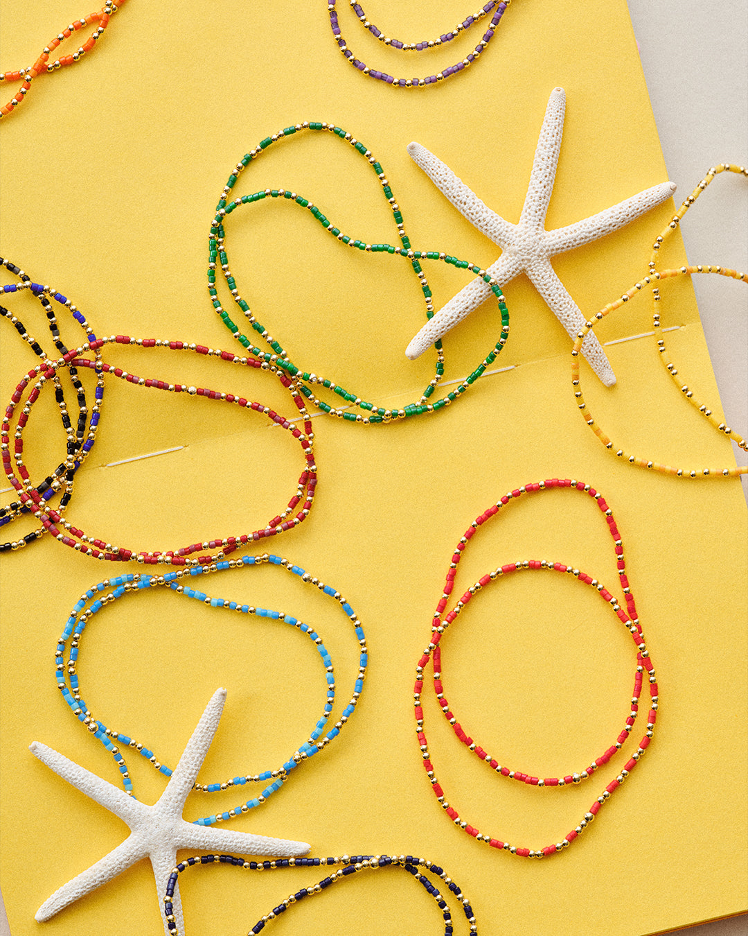 colorful beaded bracelets and starfish