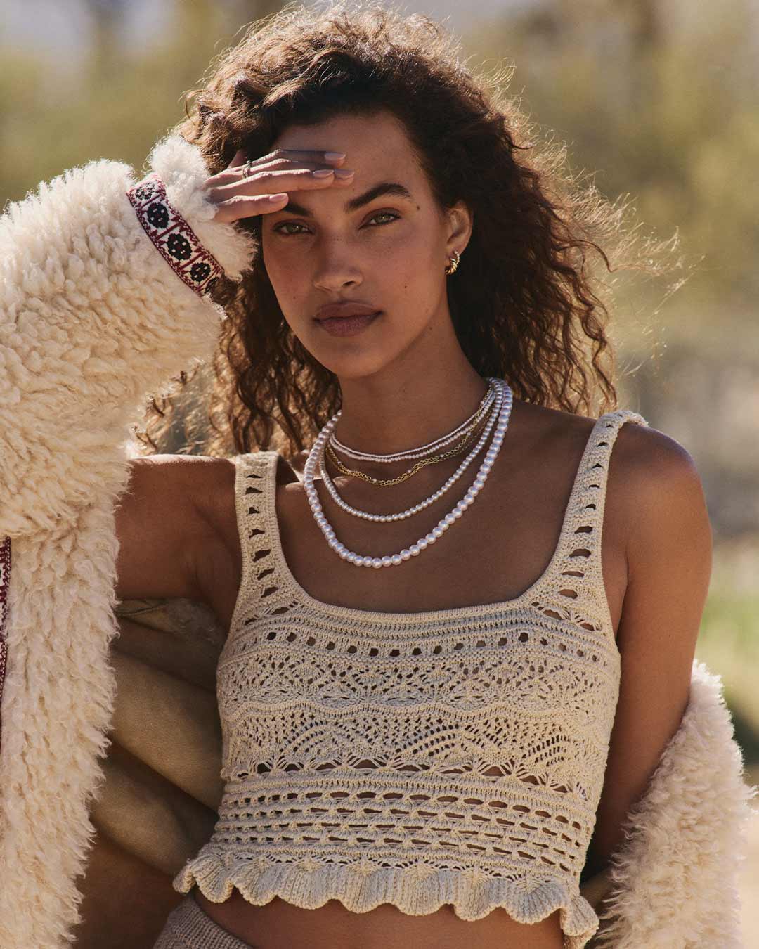 Woman wearing pearl necklaces