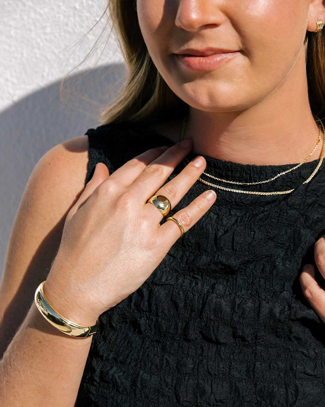 <strong>@carterfish </strong>in the Reed Huggies, Taum Necklace, Bodhi Mini Necklace, Lou Helium Ring, Sloane Ring and Paseo Cuff. 