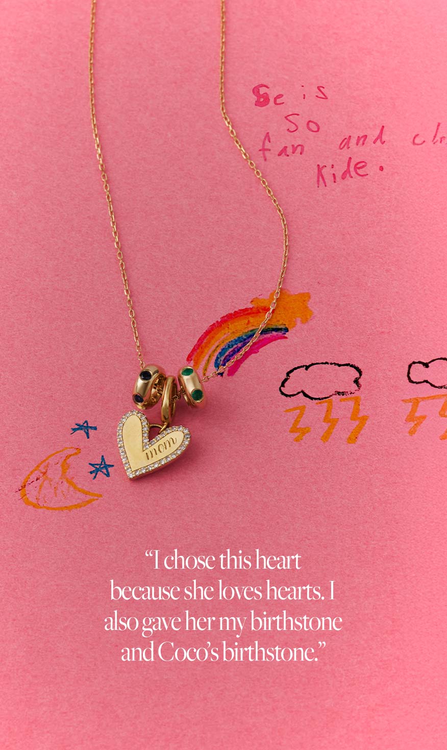 Necklace with heart charm on pink background with doodles