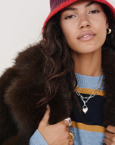 Woman wearing silver jewelry 