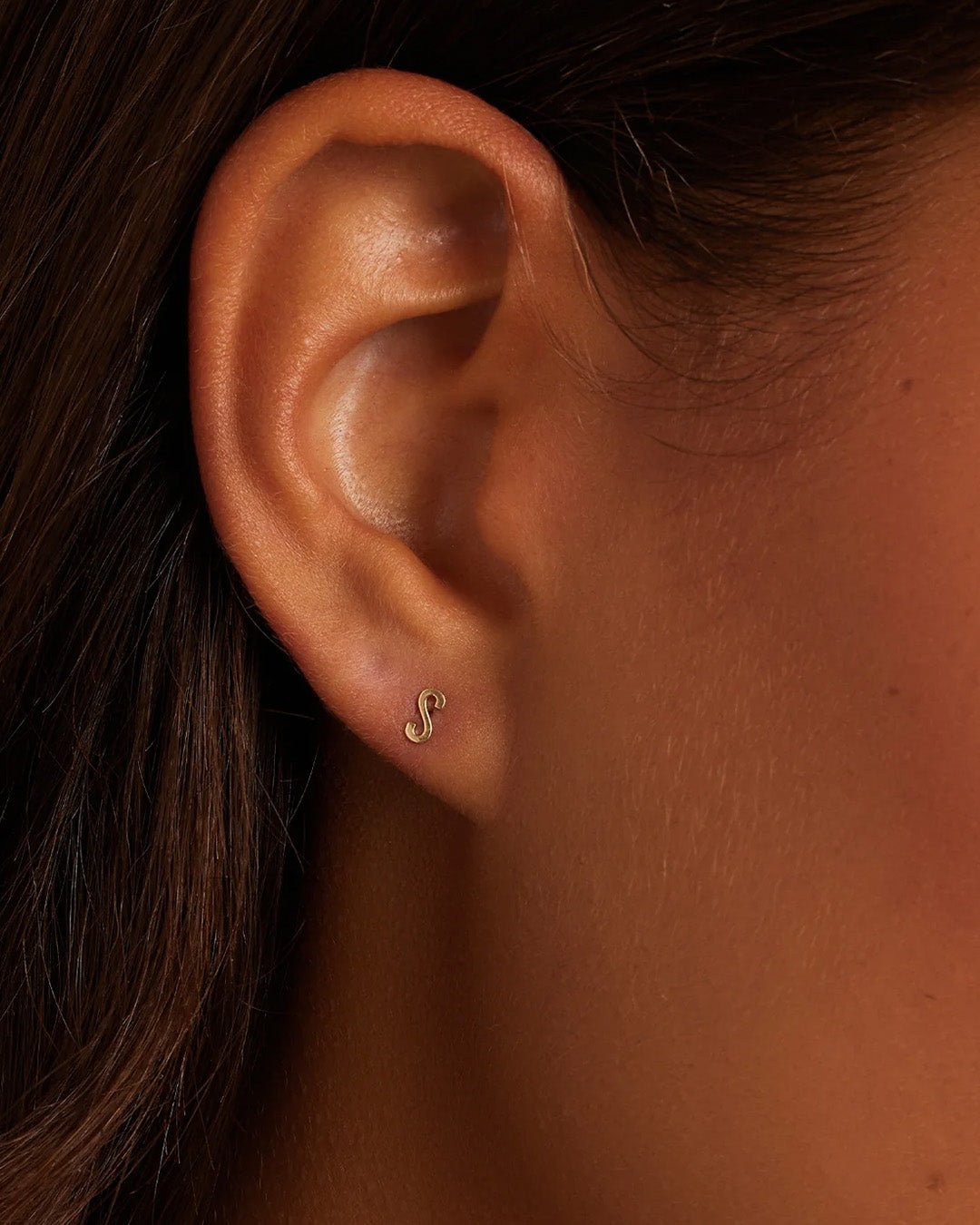 Woman wearing alphabet earring stud || option::14k Solid Gold, S, Single