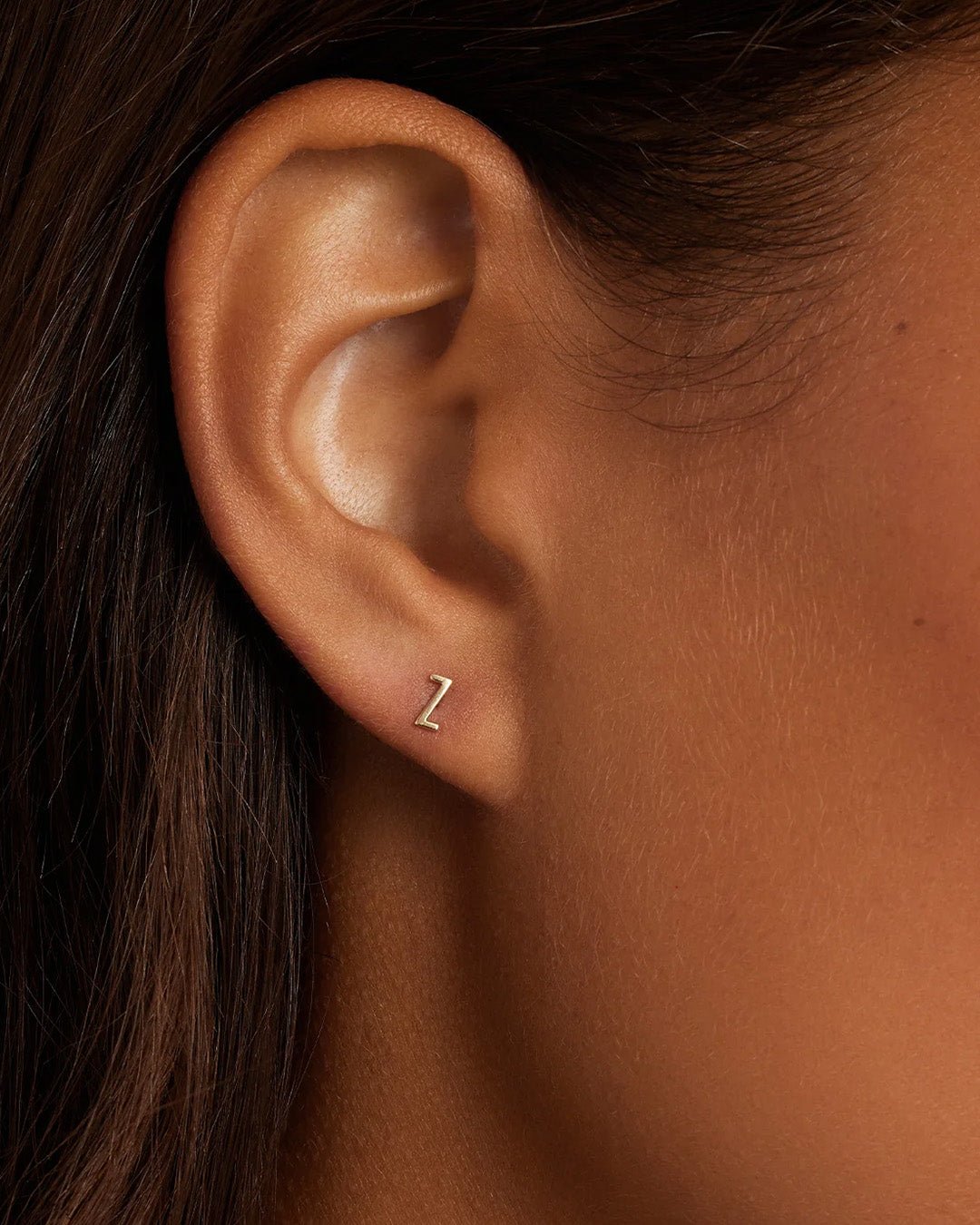 Woman wearing alphabet earring stud || option::14k Solid Gold, Z, Single