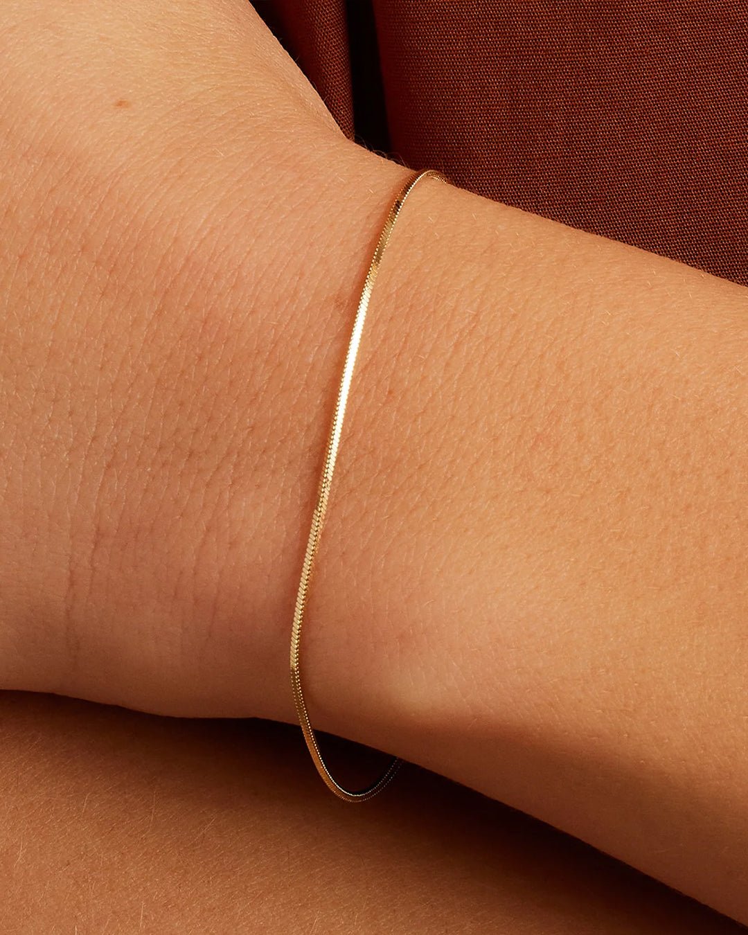 Woman wearing  Micro Mini Venice Bracelet  || option::14k Solid Gold, 6.5 in.